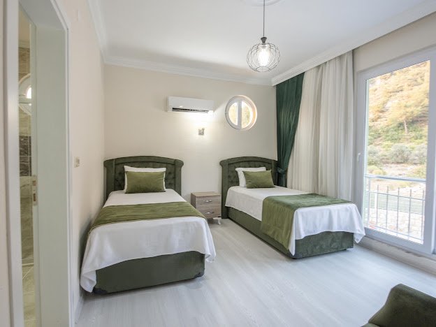 GÜVEN HOMES'TAN FETHİYE FARALYADA SATILIK EŞYALI 5+2 LÜKS VİLLA